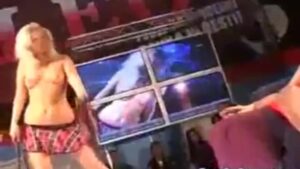 Watch – Porn on stage teasing a horny guy while stripping wild