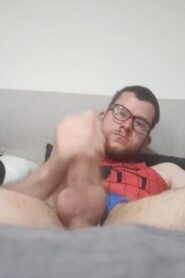 Watch – Man masturbating in a spiderman one piece