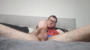 Watch – Man masturbating in a spiderman one piece